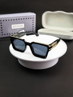 Gucci_gold_black_g2